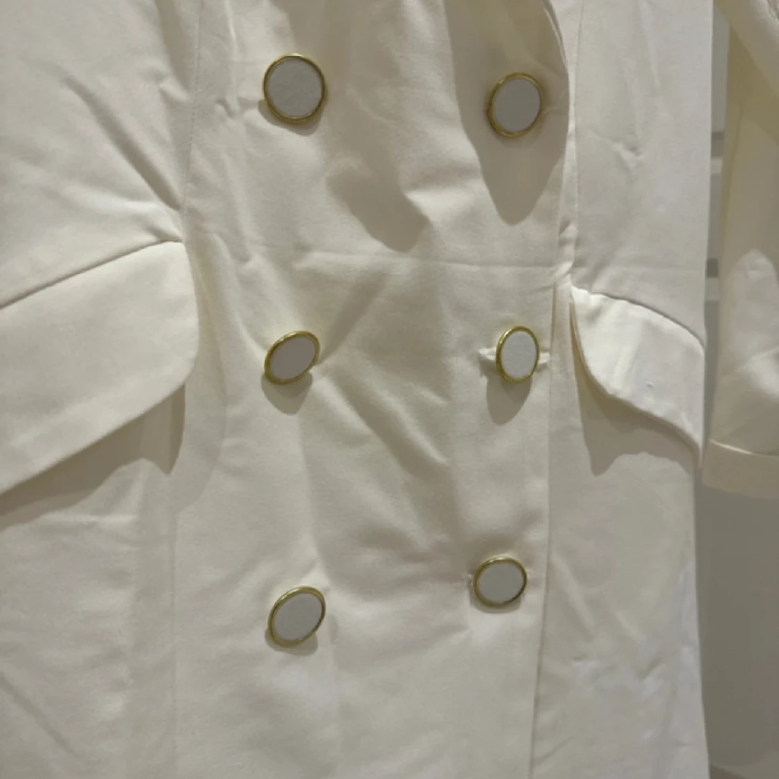 Lång creame kavaj 40  - 90