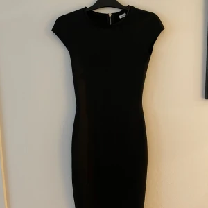 Figurklänning  - Fin figurklänning 