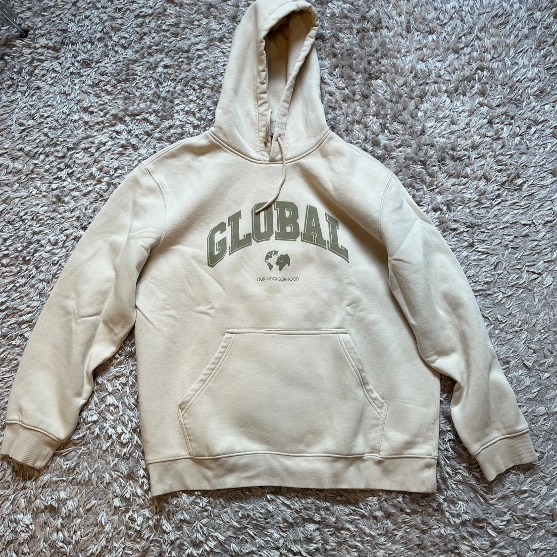 Hoodie ”Global” från HM