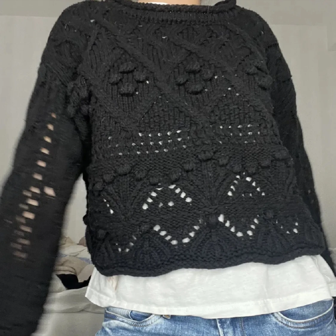 Stickad svart tröja