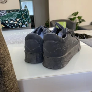 Gray shoes  - New shoes unused due the size.  Size 44  
