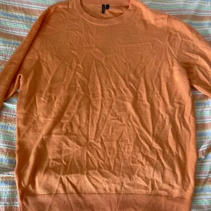 Tunnare stickad - Fin orange färg