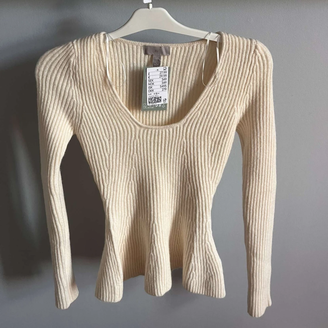 Stickad volangtröja