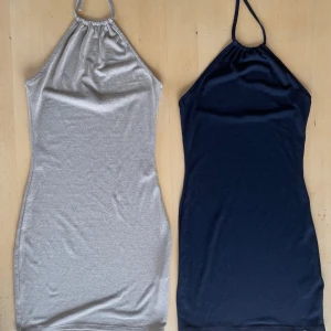 Halterneck klänning från HM - Fina klänningar från HM, sitter snyggt. En klänning för 30kr, båda för 50kr. 