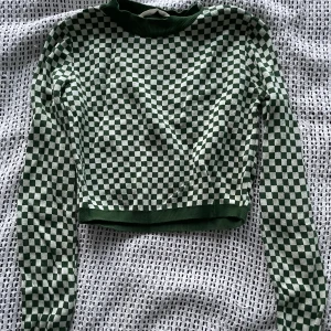 Rutig stickad tröja - Grön rutig stickad tröja