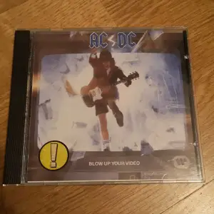 Ac dc blow up your video cd bra skick 