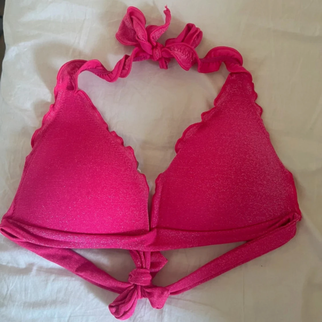 Rosa glittrig bikiniöverdel