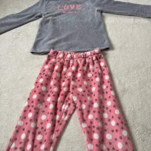 Very warm, soft and cozy set.  “Love to snooze” The material is a soft towel like. Perfect for cold snowy days. It fits perfectly  a large size too.
