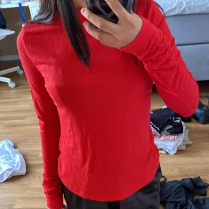 Red t-shirt  - Good condition,never worn 