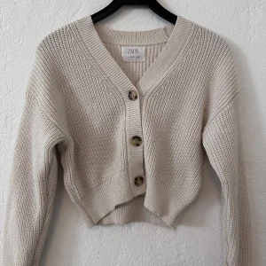 Cardigan  - Cream cardigan, worn it many times, 11-12/XS?