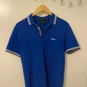 Hugo boss piké  - Blå hugo boss piké använda 2 gång köpt för 900