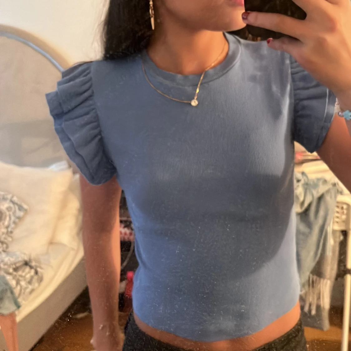 Blå t-shirt med volanger - 91