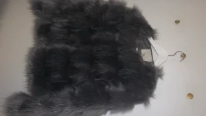 Jacka - Jacka i fuskpäls, storlek S men passar både XS och M. 