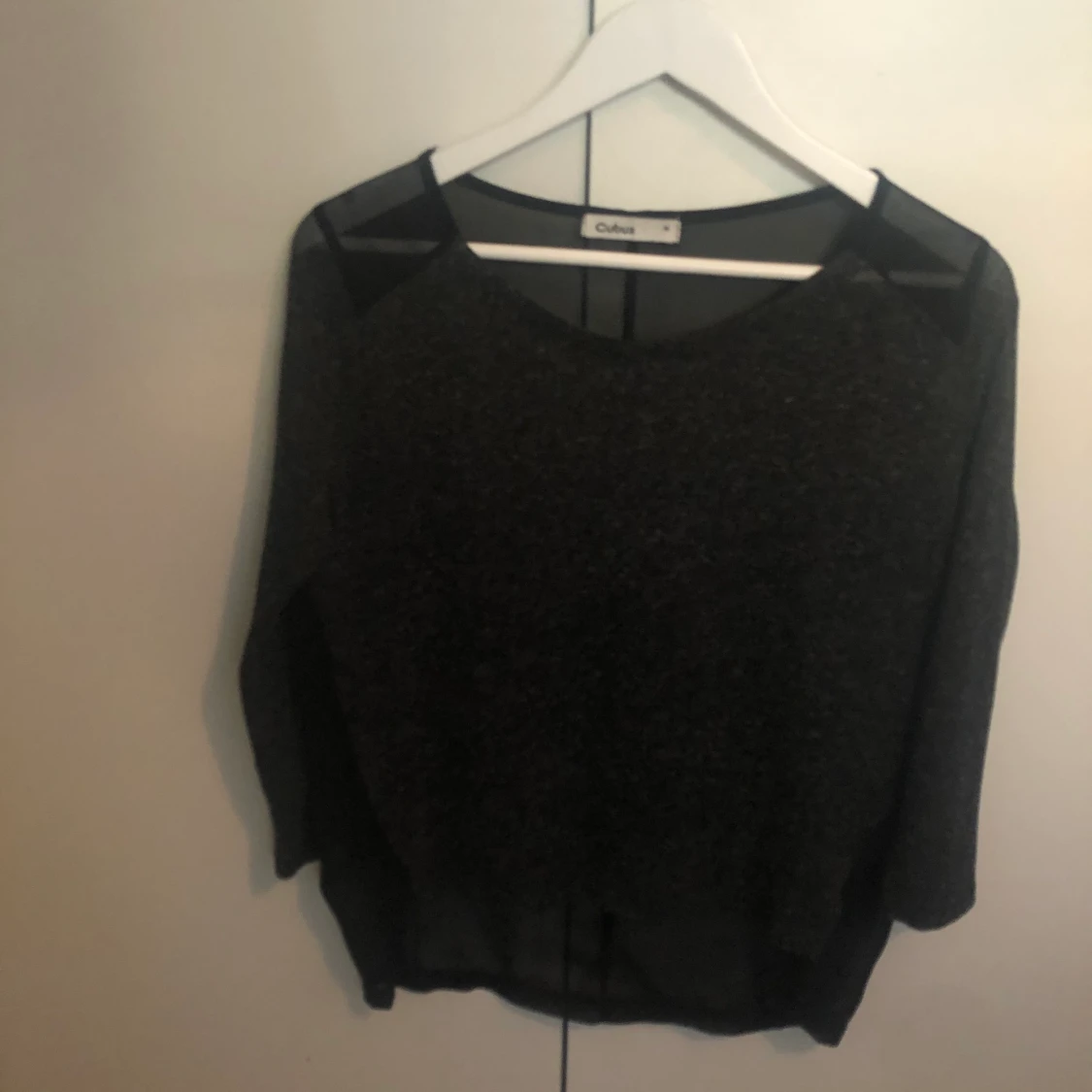 Tröja med transparent rygg 