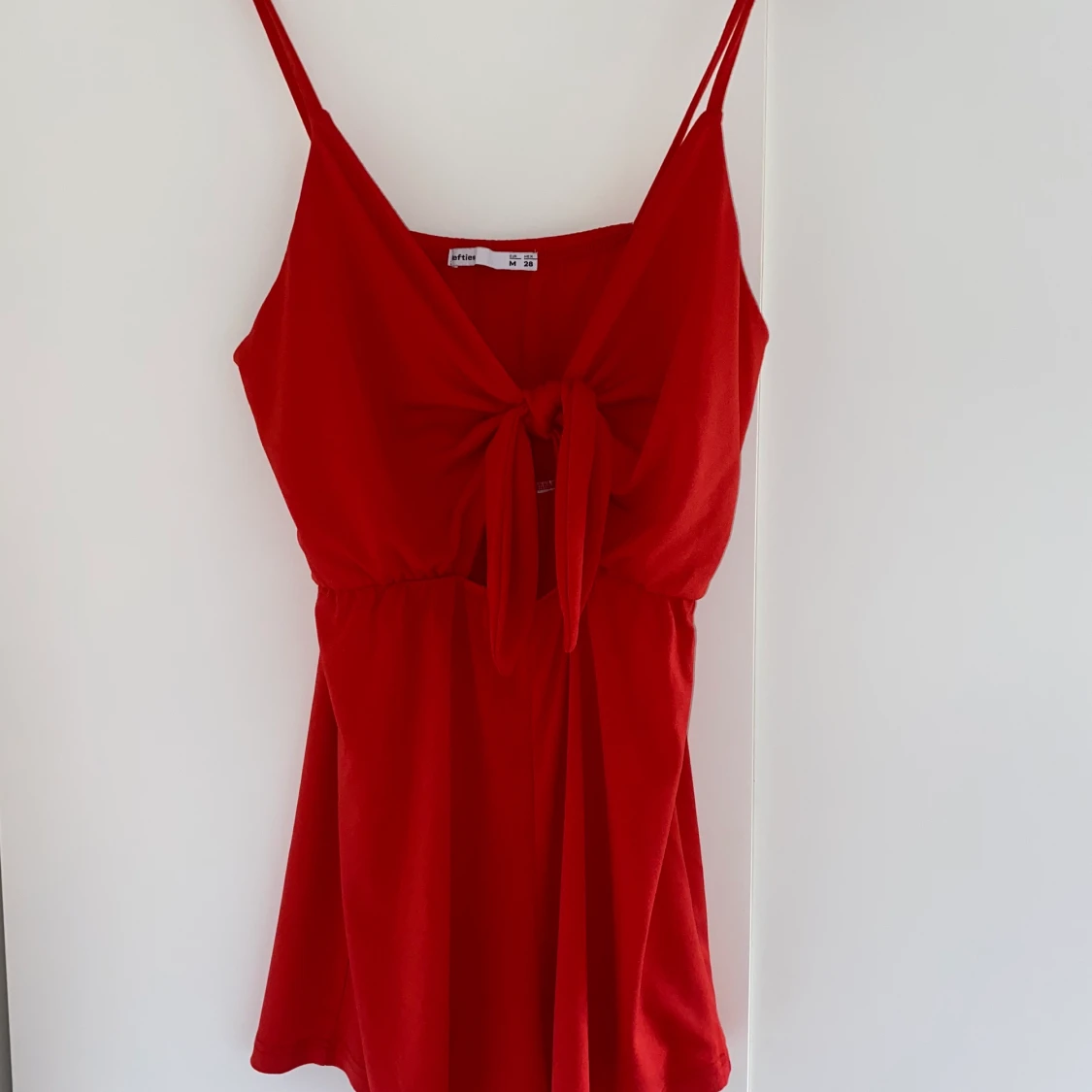 Playsuit röd Stl M - 90