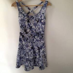 H&M, dress with blue and white flower print. The fabric is bit thicker, non see through 