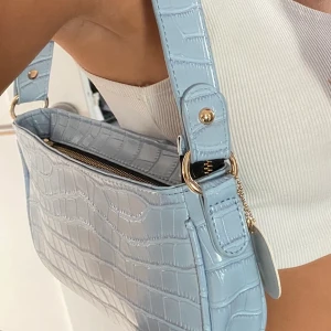 Ljusblå väska - Ljusblå väska från shein, aldrig använd, lappen kvar💖