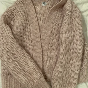 Kofta  - Sparsamt använd. 