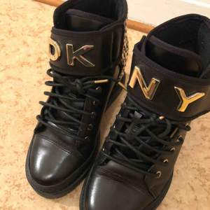 High wedge Dkny, Black and gold,Size 37.5 fit to 37 and 38 both.New price 1800