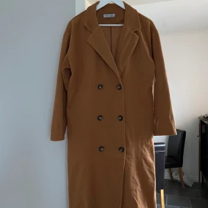 Ny kappa - Kappa ny i stretch tunn perfekt att ha en hoddi eller tjocktröja under M-L 