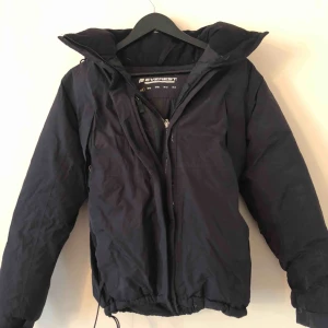  - Everest winter Jacket. In Black with Hood. Excellent condition. Size 34 