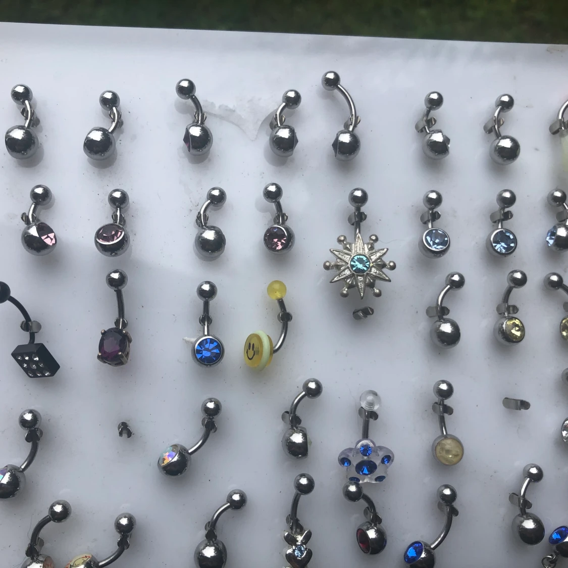 Smycken. Navelpiercing