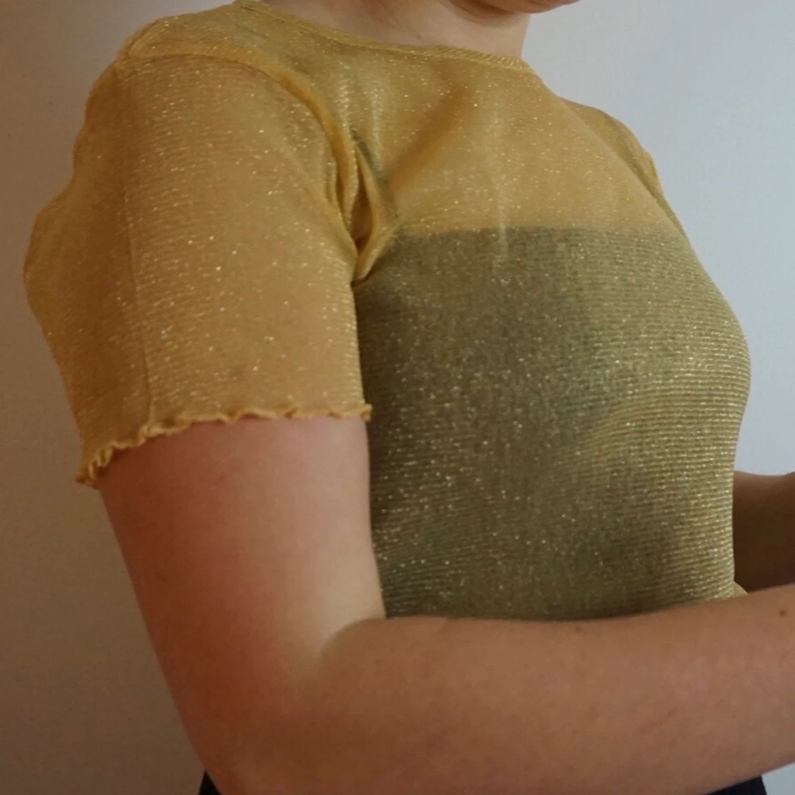 Glittrig och guldig meshtopp - 90