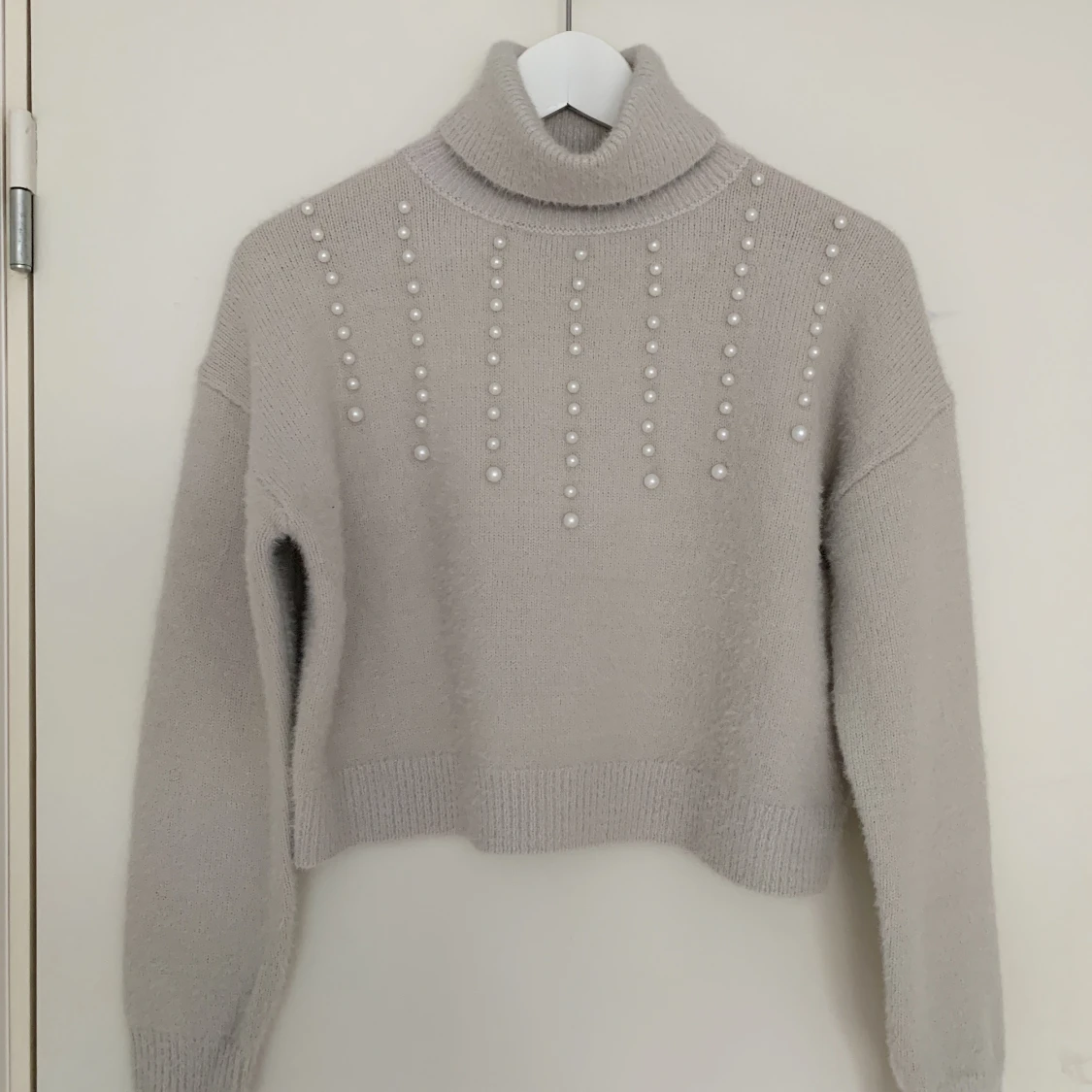 Turtelneck m. paljetter strl S