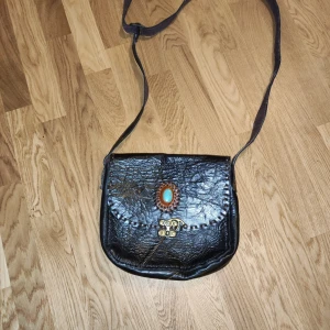 One size - Skinnväska 