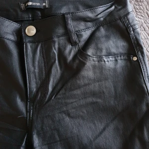 Black coated trousers - Black coated super skinny trousers - worn once.