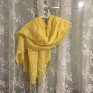  - Super soft and warm scarf, bought in Germany. Can be used as a shoulder cover on a dress, for example.