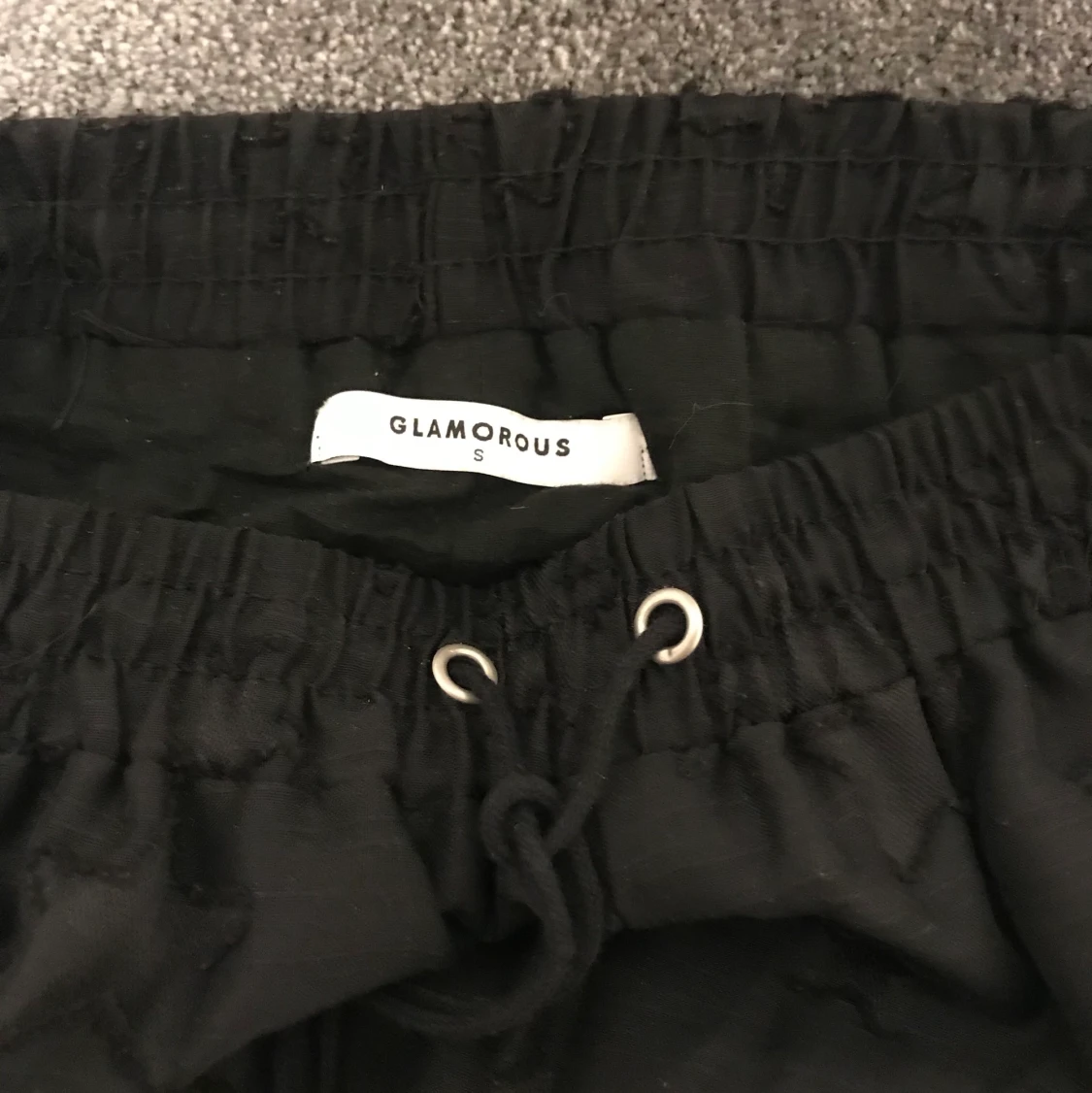 Svarta byxor med stjärnor  - 91