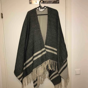  - Varm poncho