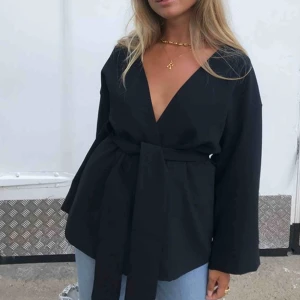  - Blazer med vida armar