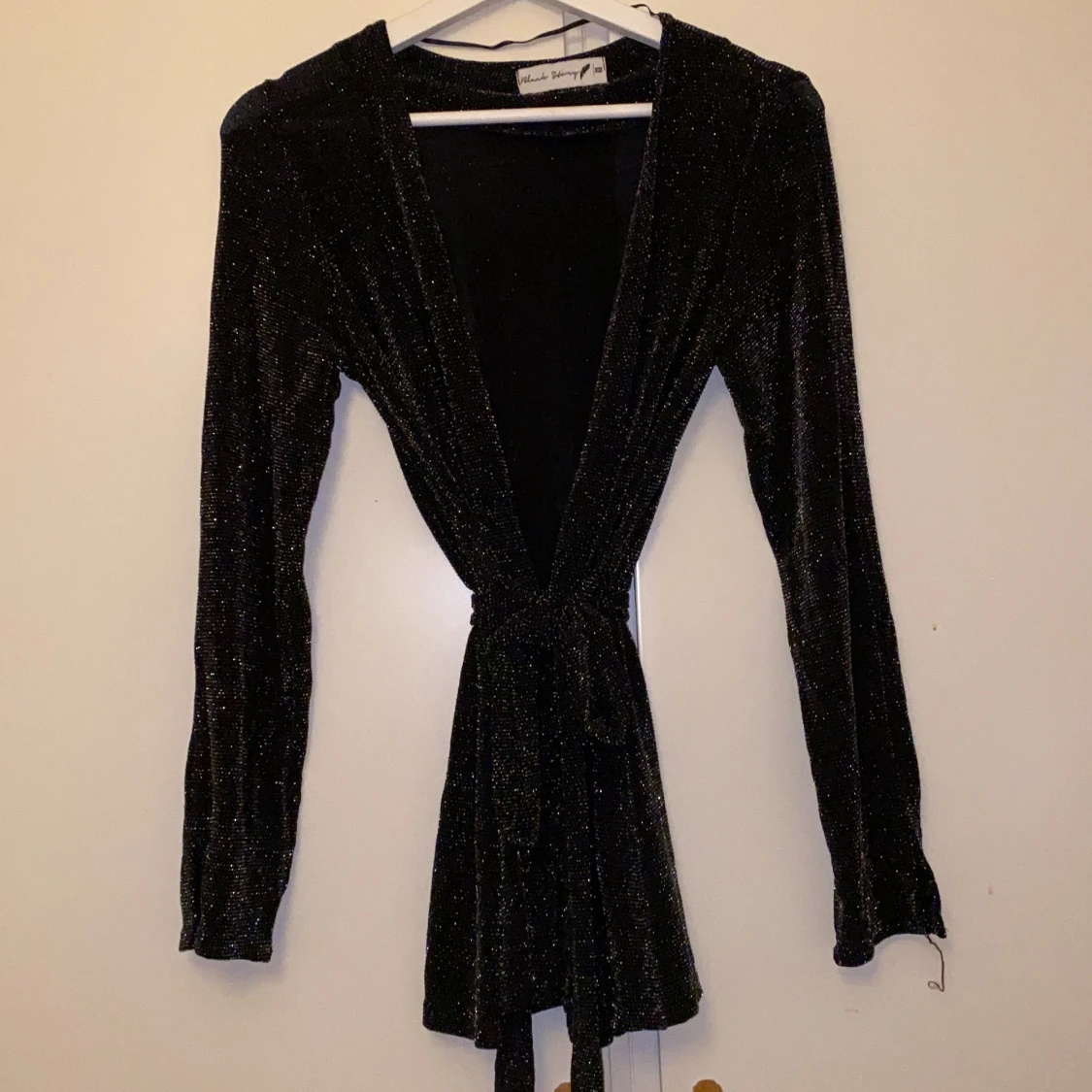 Glittrig kofta/tröja