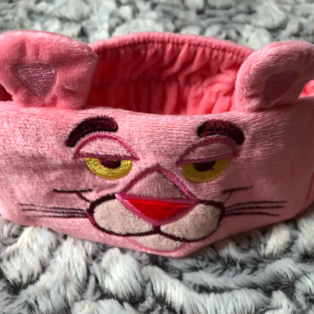 Pannband The pink panther  . Accessoarer.