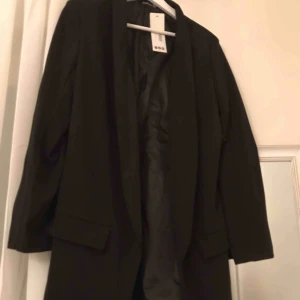  - Svart kappa aldrig använd