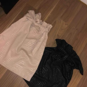  - Två kjolar med skärp till Orm mönster 