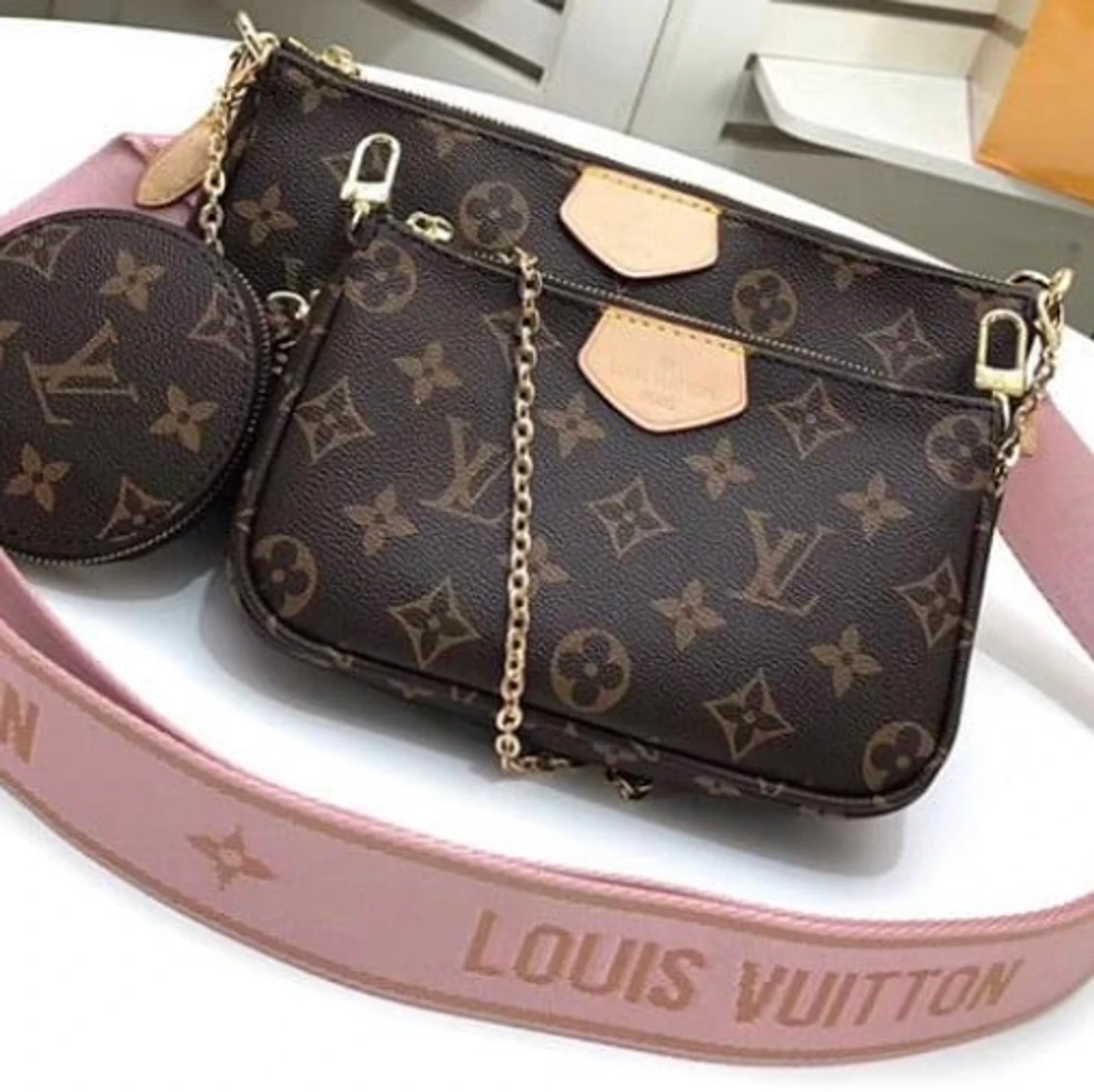 LV MULTI POCHETTE - 90