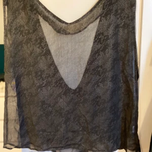 Storlek L  - Fint genomskinligt linne 