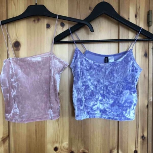  - Ett rosa & ett lila linne i ”sammet”, croped. Knappt använd, köparen står för frakten 