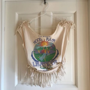  - Vintage topp med fransar och knytning i sidorna.