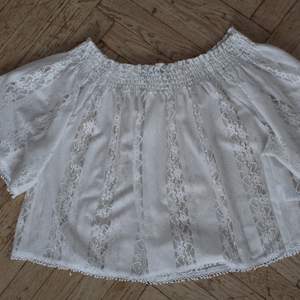 One of my favorite clothing items - laced - off shoulder - 100% polyester - can be worn for sizes S and M as well