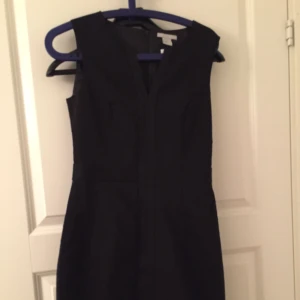  - Helt ny klänning med prislapp.  