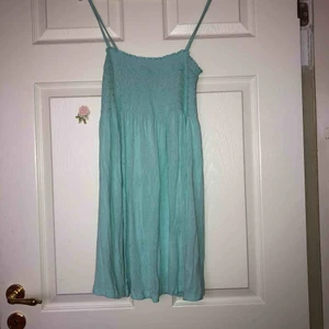  - Fin turkos tunika/klänning. Inköpt på H&M. 