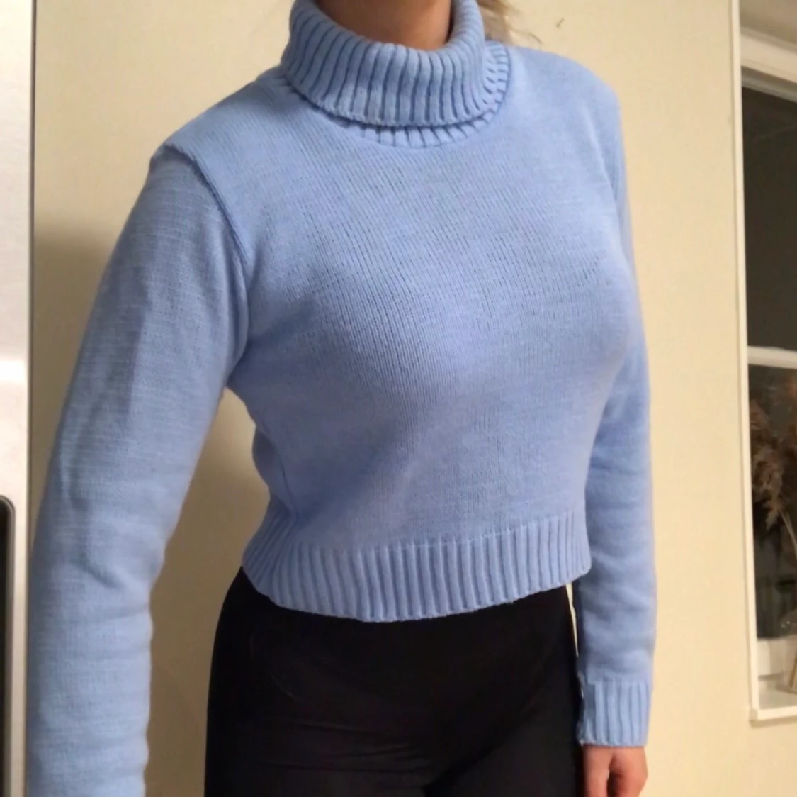 Ljusblå polotröja