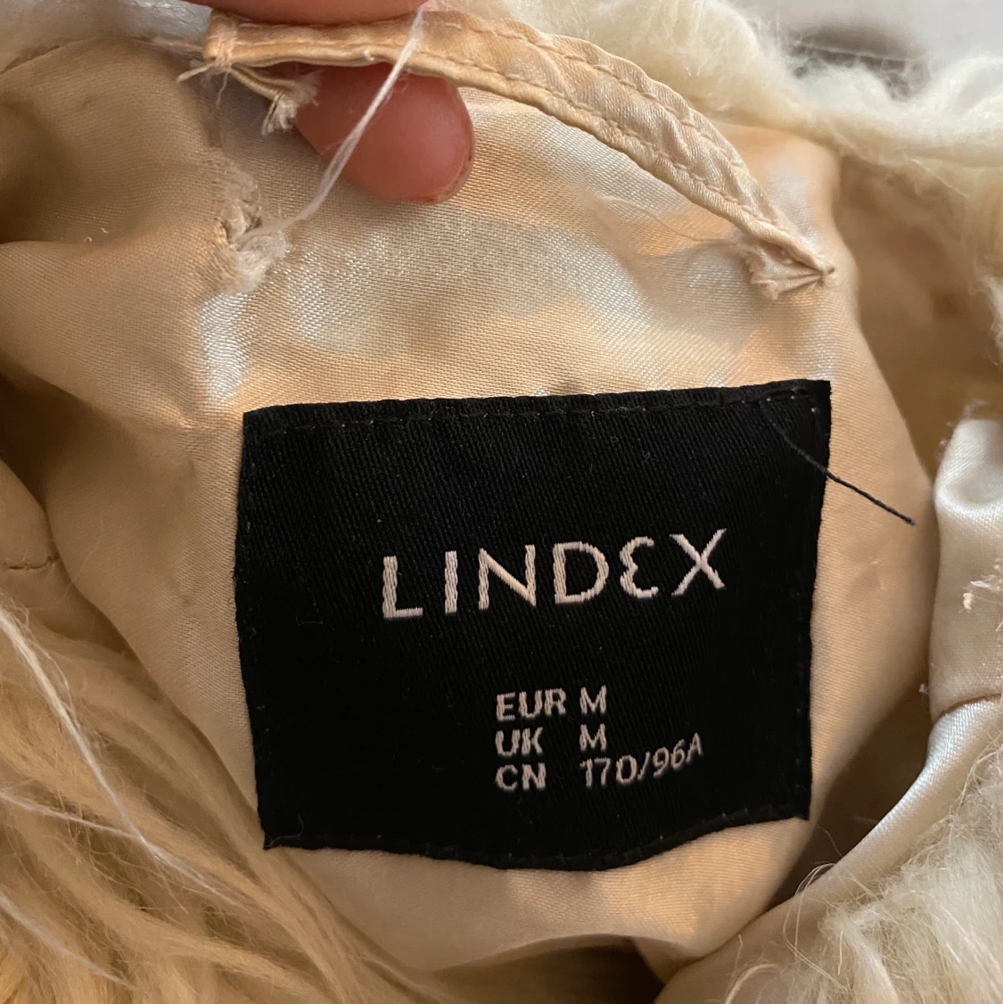 Fluffig fejkpäls - 90