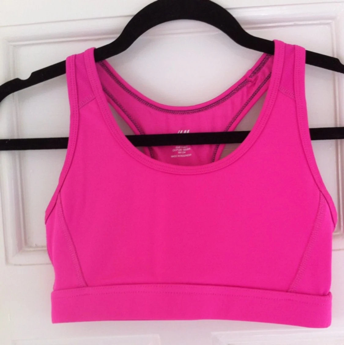 Sporttopp med dubbelt tyg - H&M