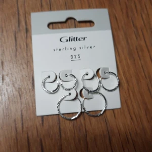 Silver örhängen  - Sterling silver örhängen från glitter, aldrig använda. 