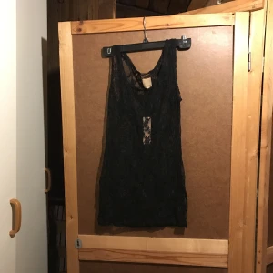  - Ny med lapp kvar transparent topp